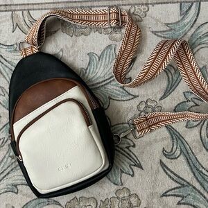 Black, Brown, and Cream Sling Bag